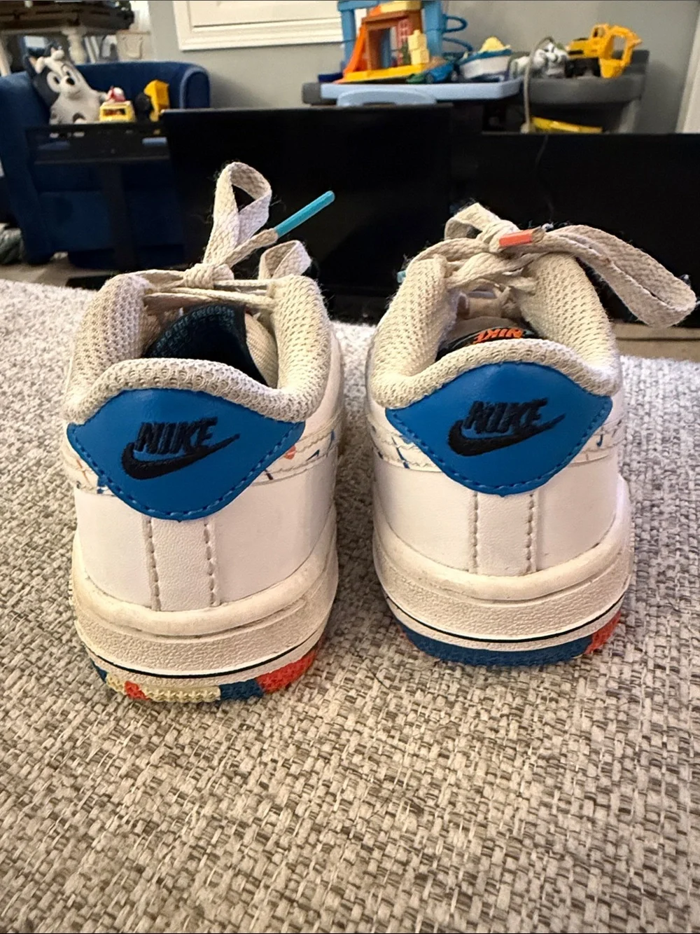 Nike Kids White Leather Sneakers with Blue and Multicolor Accents